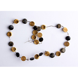 Gold and obsidian beads ... 