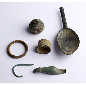 Group of six bronze objects
1st  ... 