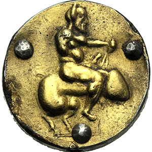 A gilded stud with satyr riding ... 