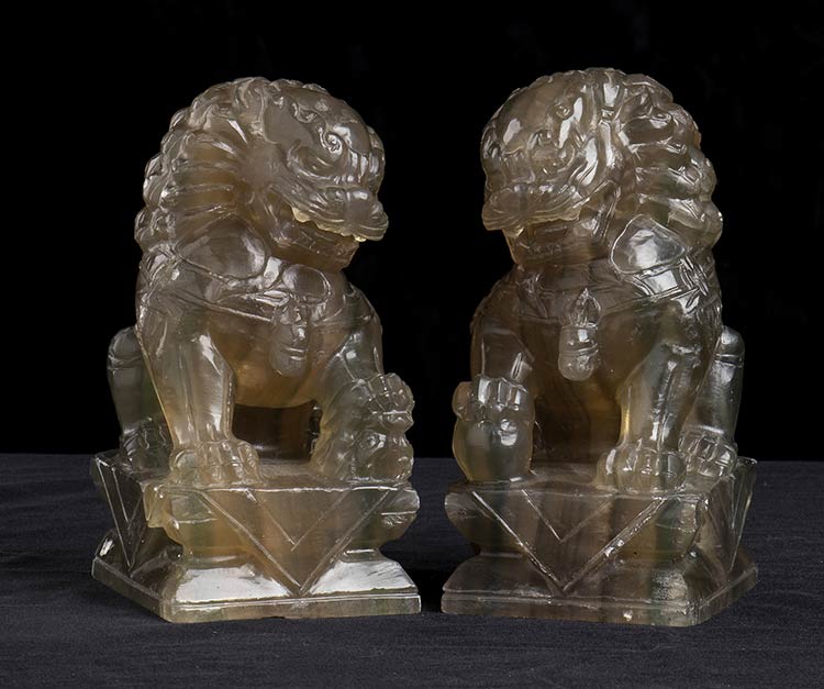 A PAIR OF CARVED STONE BUDDHIST ... 