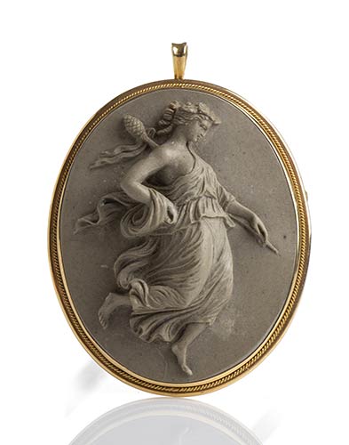 A gold mounting lava stone cameo ... 