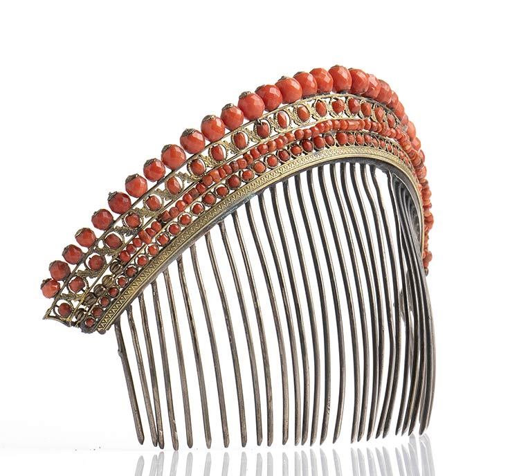 A coral comb tiara decorated with ... 