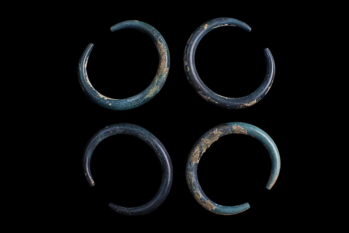 COLLECTION OF 4 BRONZE BRACELETS ... 