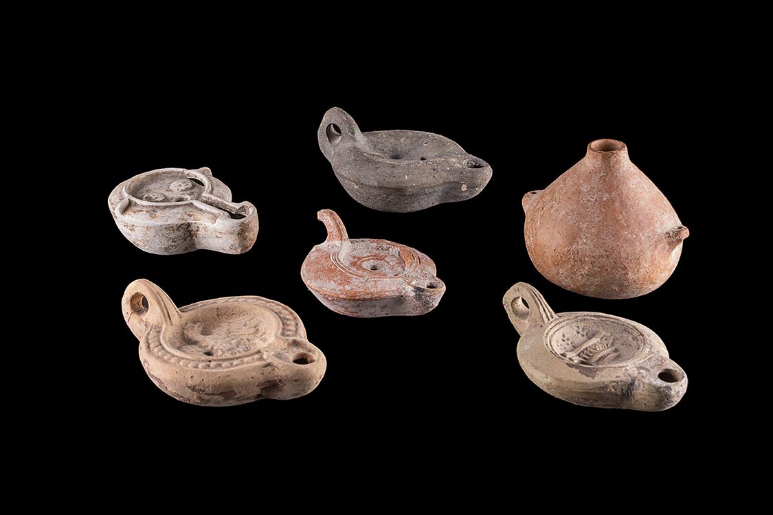 COLLECTION OF ROMAN LAMPS AND VASE ... 