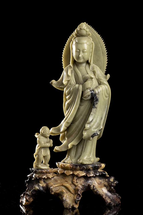 A SOAPSTONE GUANYIN AND ... 