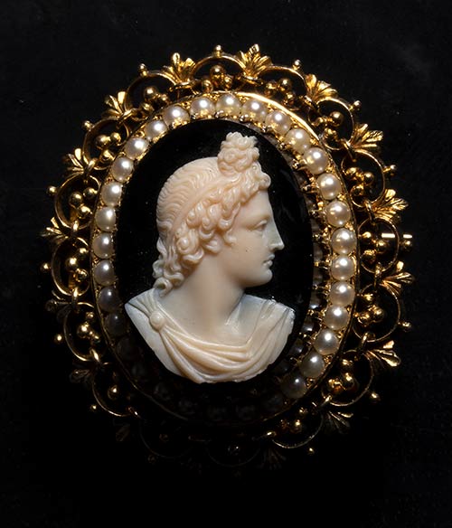 A neoclassical onyx cameo set in a ... 