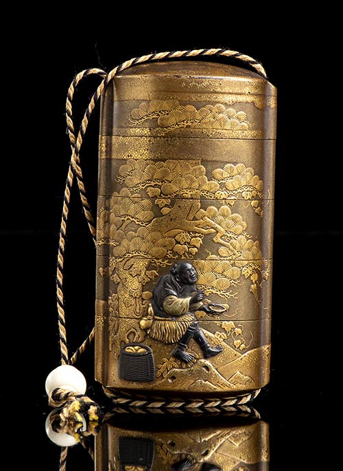 A LACQUERED AND GILT WOOD INRŌ ... 