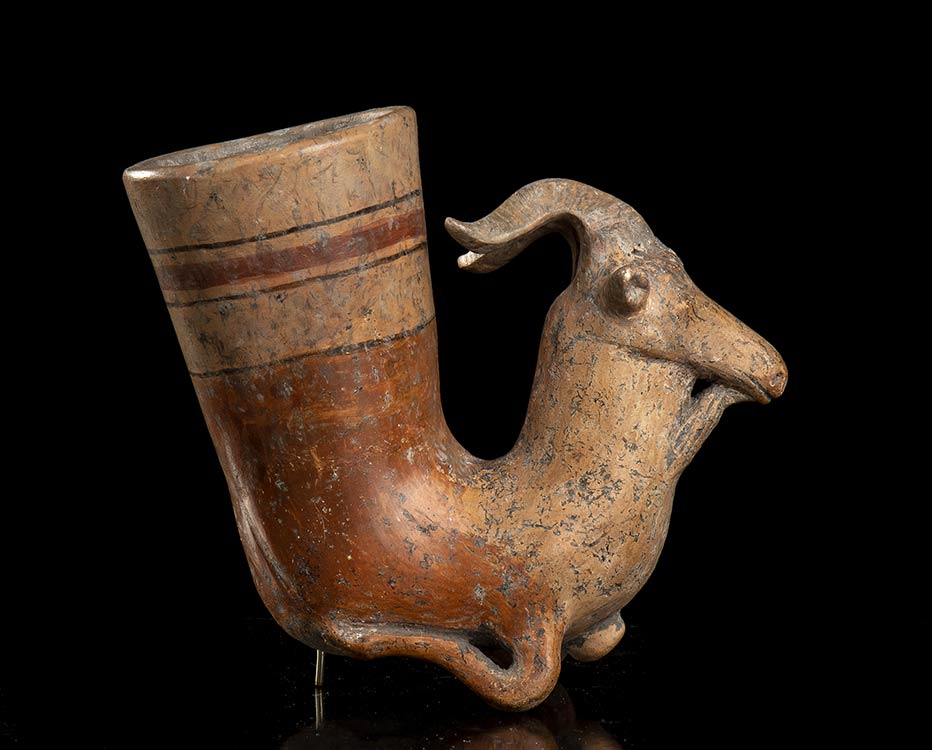 A PAINTED POTTERY ZOOMORPHIC ... 
