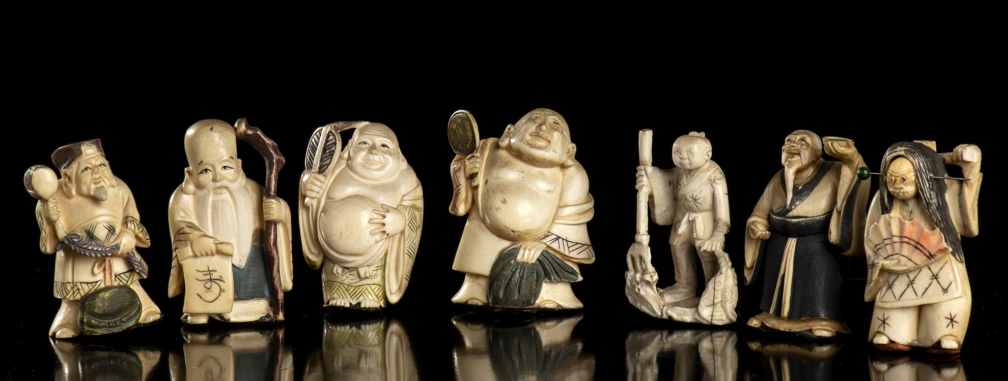 SEVEN SMALL IVORY FIGURES
China, ... 