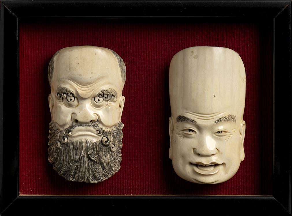 TWO IVORY MASKS
China, early 20th ... 