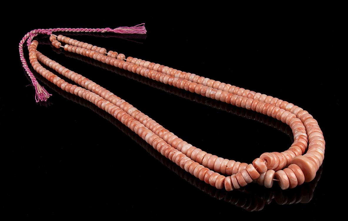 2 pink coral washer beads ... 