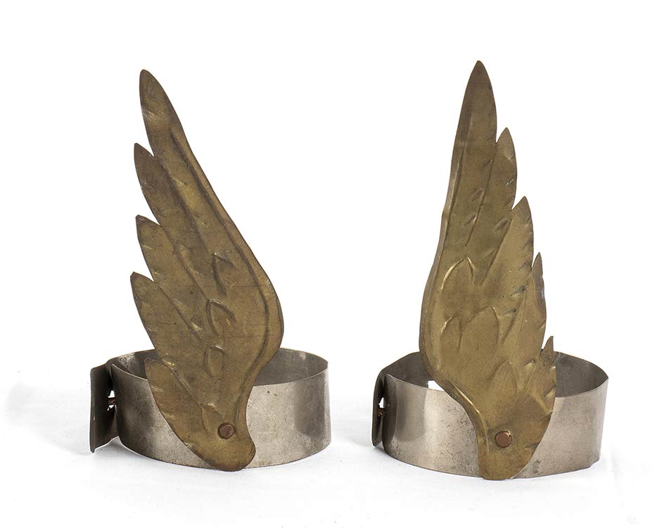 A PAIR OF METAL CUFFS FOR ... 