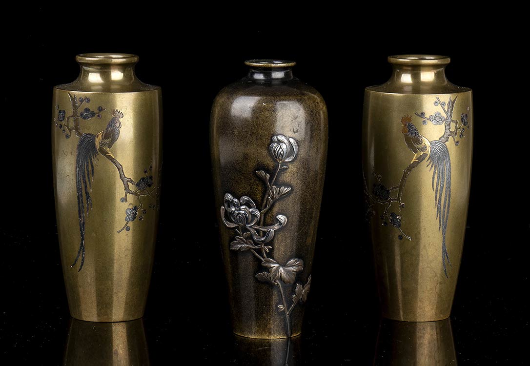 THREE METAL VASES WITH DIFFERENT ... 