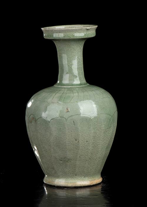 AN INCISED AND CÉLADON GLAZED ... 
