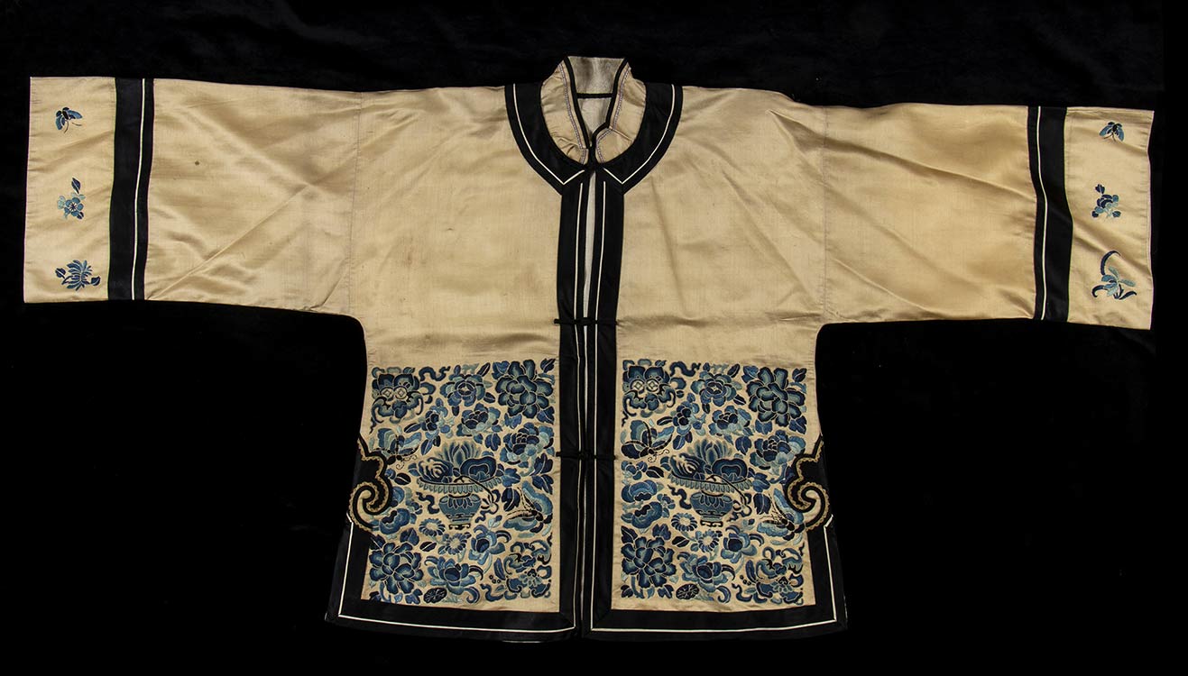 AN EMBROIDERED SILK FEMALE JACKET ... 