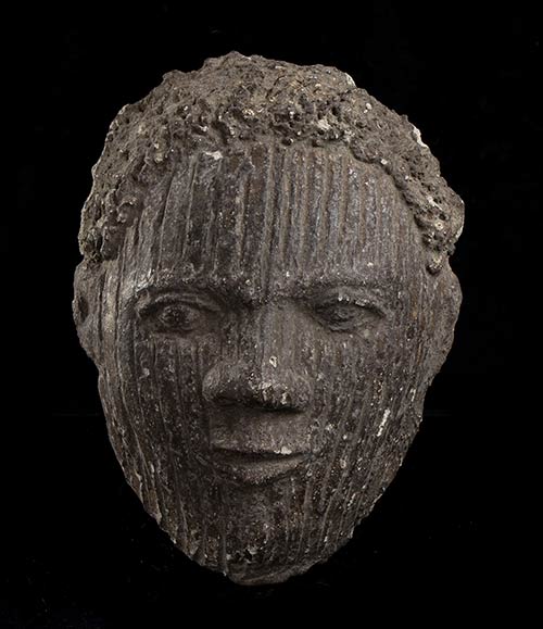 A POTTERY MASK Africa28 x 21 ... 