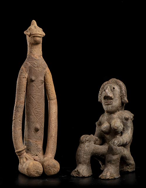 TWO POTTERY FIGURES Africa39 x 11 ... 
