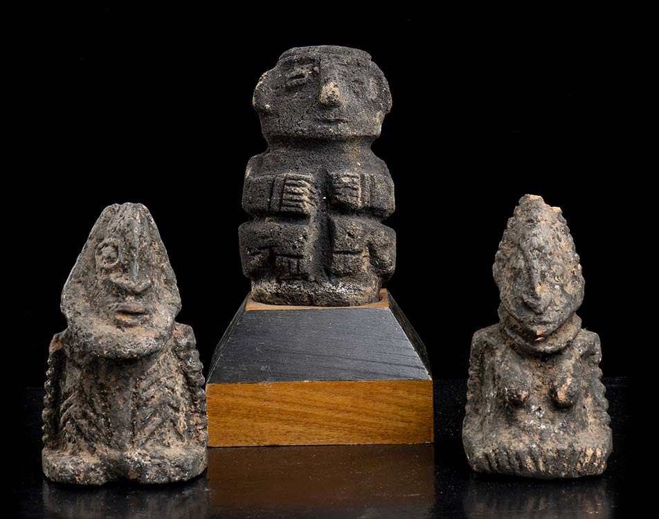 THREE POTTERY AND STONE FIGURES ... 