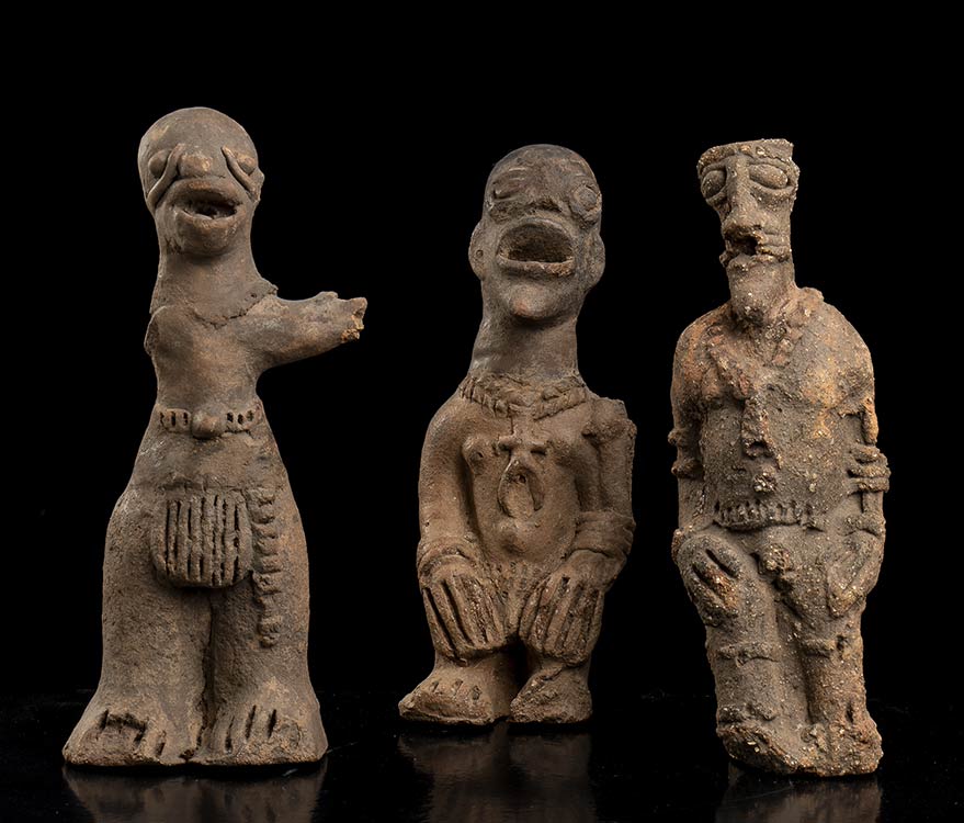 THREE POTTERY FIGURES Africa26 x ... 