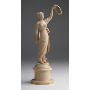 A carved ivory figure of a young ... 