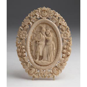 A carved ivory frame with ... 