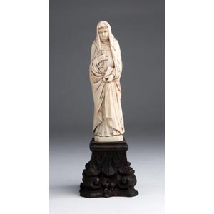 Saint Therese. A carved ivory ... 