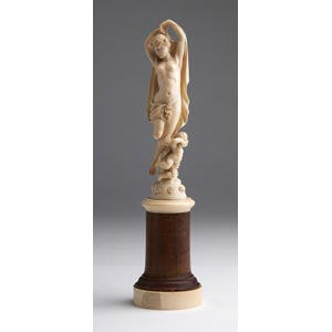 A carved ivory allegorical female ... 