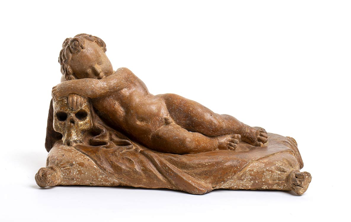 Sleeping putto over a skull - ... 