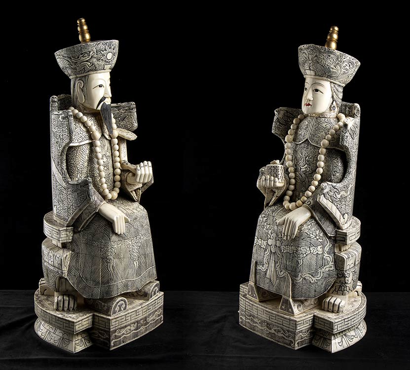 A PAIR OF BONE LARGE FIGURES OF AN ... 