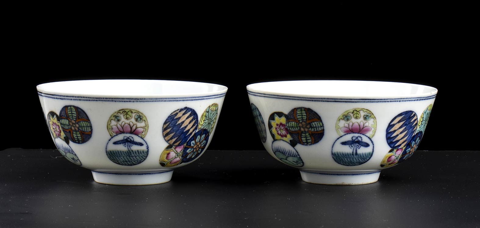 A PAIR OF POLYCHROME ENAMELED ... 