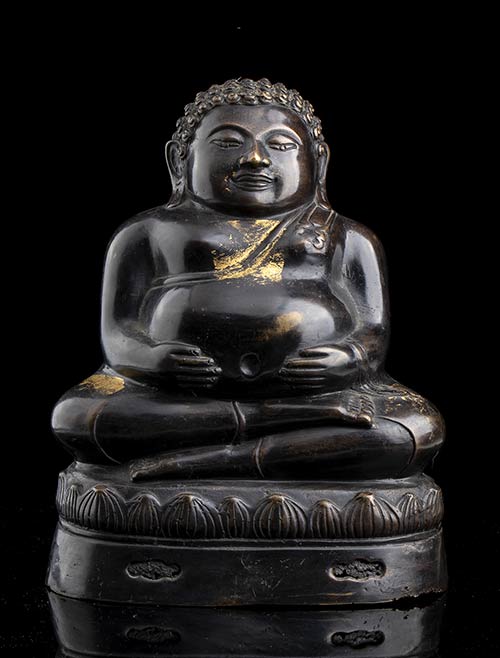 A GILT BRONZE SCULPTURE OF PHRA ... 