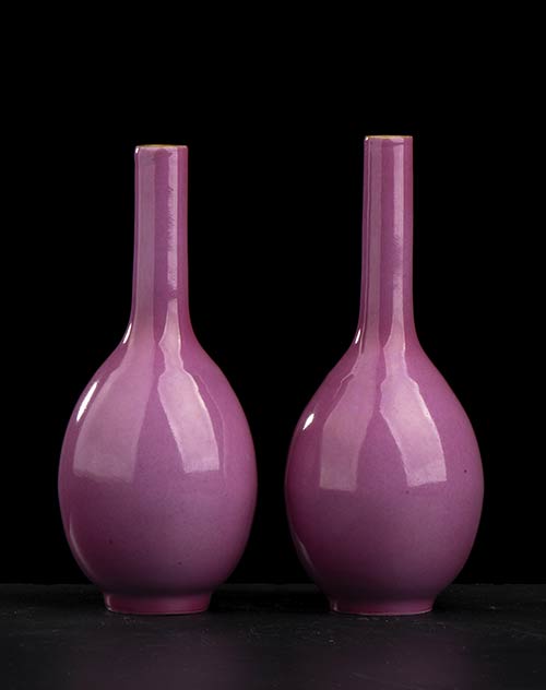 A PAIR OF RUBY GLAZED PORCELAIN ... 