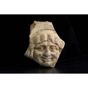 Roman antefix with the head of ... 