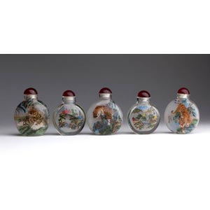 Five painted glass snuf bottles;XX ... 