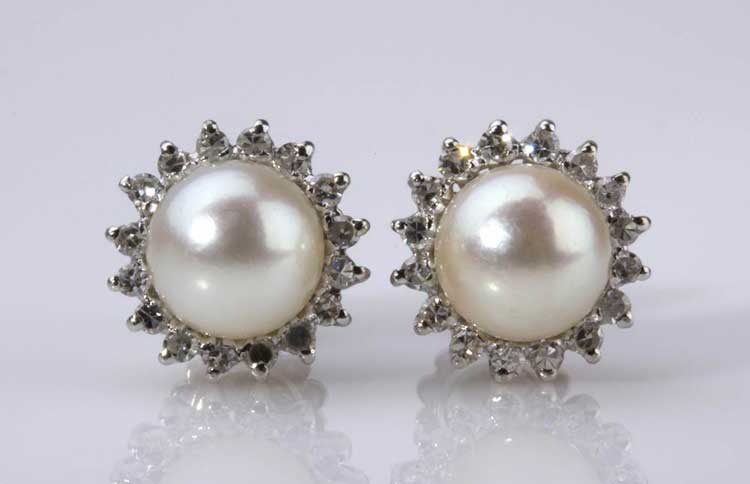 PAIR OF CULTURED PEARL AND DIAMOND ... 