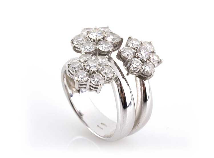 DIAMOND RING; shaped as three ... 