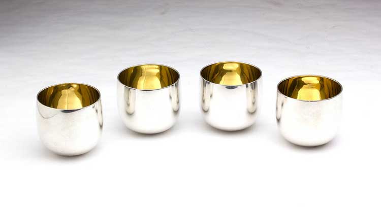 A SET OF  FOUR STERLING SILVER ... 