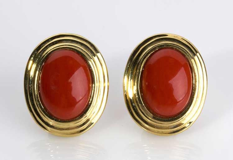CORAL GOLD EARRINGS; each set with ... 
