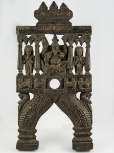 Carved wooden lectern portraying ... 