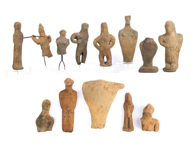 A collection of votive statuettes ... 