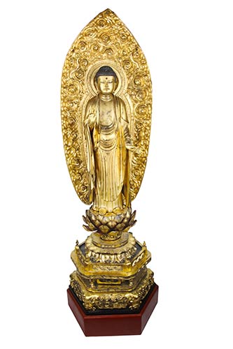 A LARGE LACQUERED AND GILT CARVED ... 
