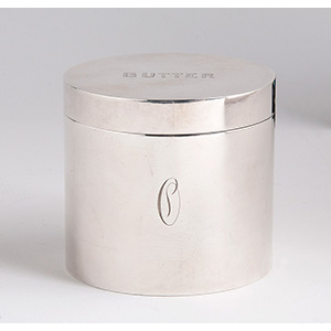 a small silver plated cylindrical ... 
