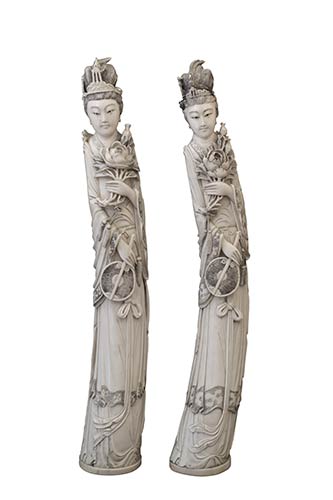 A PAIR OF LARGE IVORY CARVING OF ... 