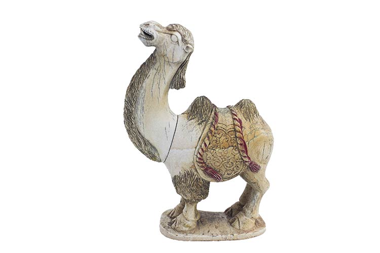 A PAINTED IVORY CARVING OF A ... 