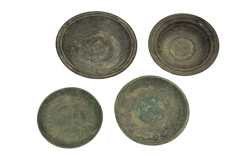 FOUR INDONESIAN BRONZE TRAYSthe ... 