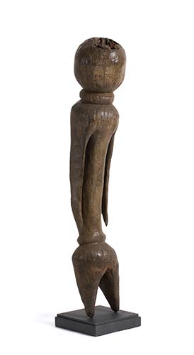 A TOBA WOODEN FIGURE OF A STANDING ... 