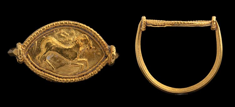 An etruscan gold ring. Horse. ... 