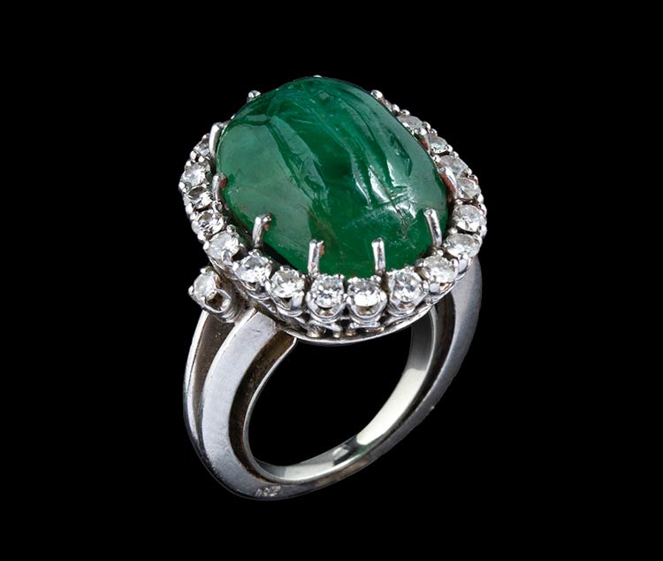 An emerald intaglio, mounted on a ... 