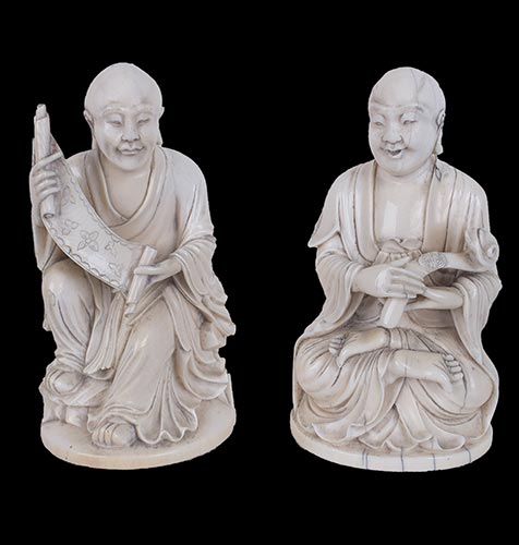 A PAIR OF IVORY CARVINGS OF LOHAN ... 