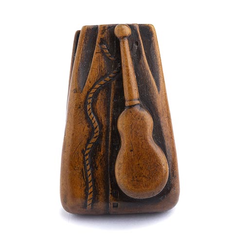 A WOOD NETSUKE OF A POUCH AND A ... 